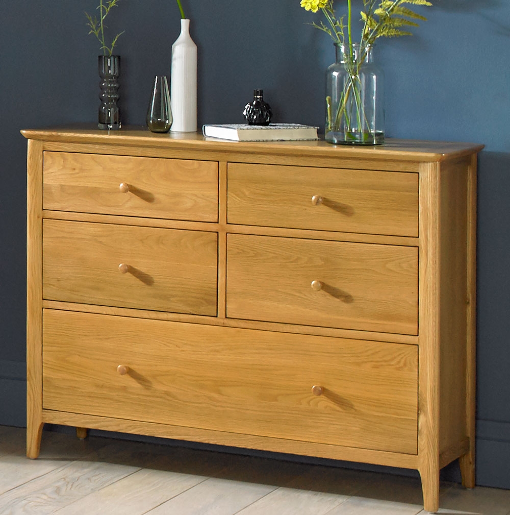 Product photograph of Cornett Oak 5 Drawer Chest from Choice Furniture Superstore.