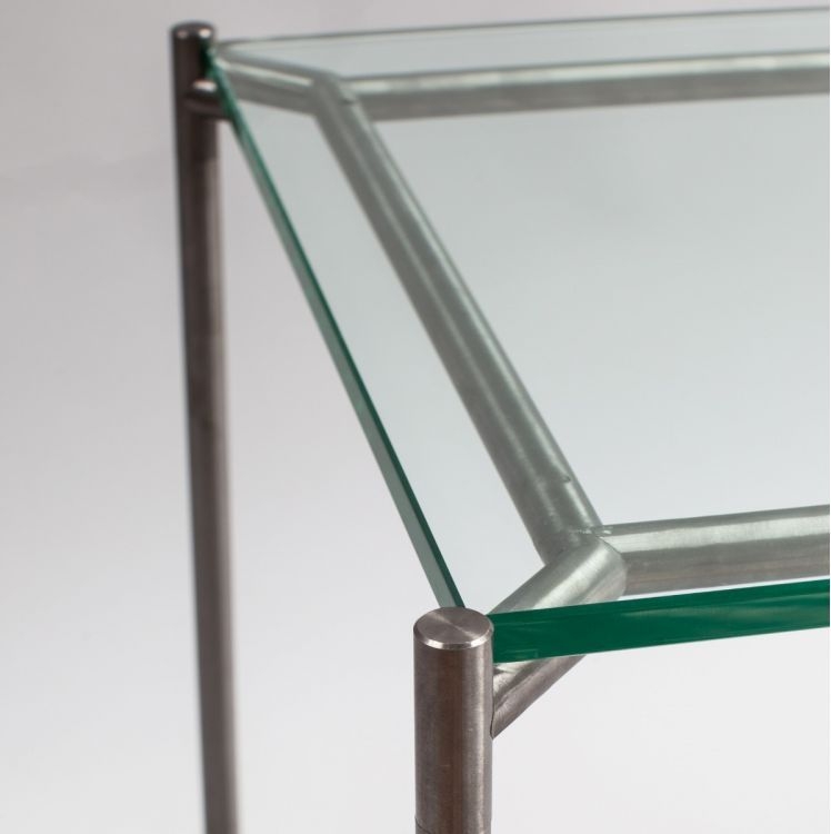 Product photograph of Gillmore Space Iris Clear Glass Top Square Coffee Table With Gun Metal Frame from Choice Furniture Superstore.