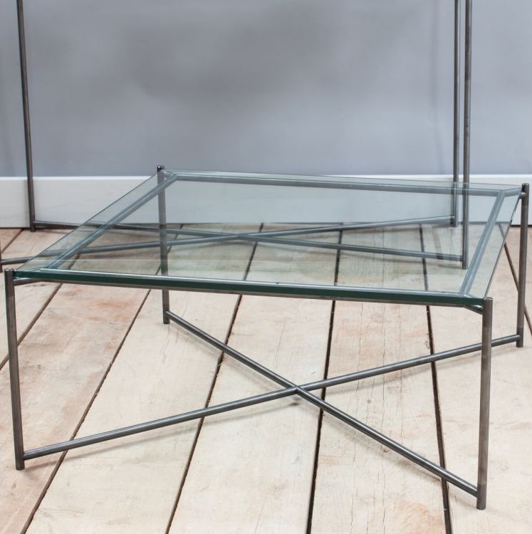 Product photograph of Gillmore Space Iris Clear Glass Top Square Coffee Table With Gun Metal Frame from Choice Furniture Superstore.