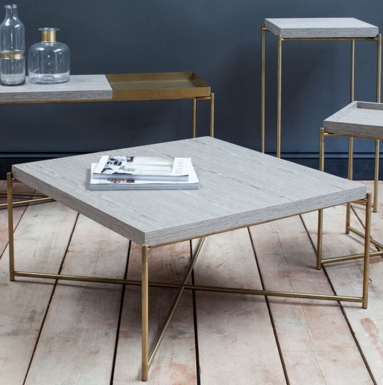 Product photograph of Gillmore Space Iris Weathered Oak Top And Small Tray Large Console Table With Brass Frame from Choice Furniture Superstore.