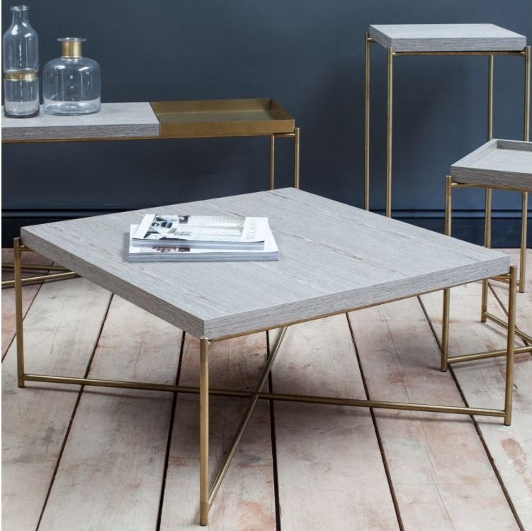 Product photograph of Gillmore Space Iris Weathered Oak Large Console Table With Brass Frame from Choice Furniture Superstore.