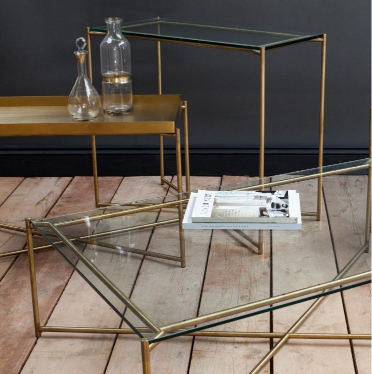 Product photograph of Gillmore Space Iris Antiqued Glass Top Large Console Table With Brass Frame from Choice Furniture Superstore.